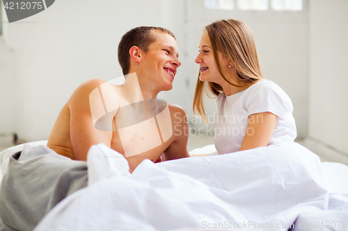 Image of Lifestyle. Beautiful couple in bed