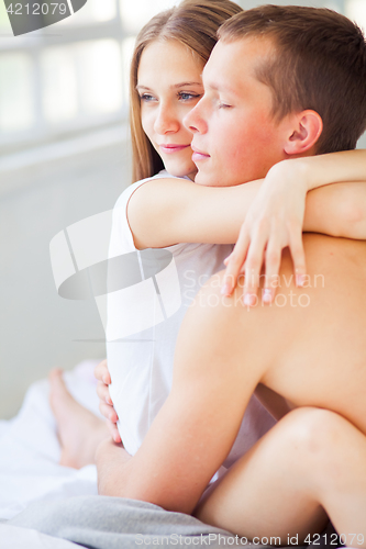 Image of Lifestyle. Beautiful couple in bed