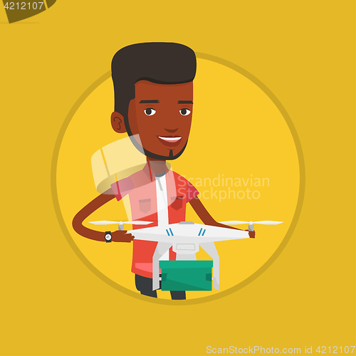 Image of Man controlling delivery drone with post package.