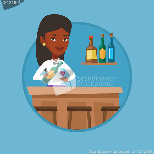 Image of Bartender standing at the bar counter.