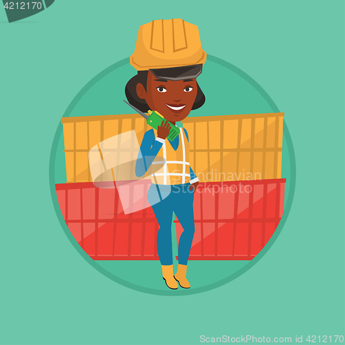 Image of Port worker talking on wireless radio.