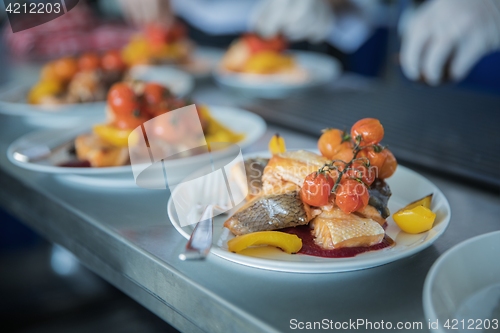 Image of Salmon steak grilled with peppers