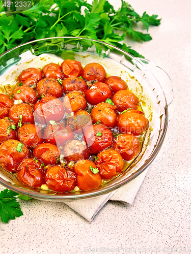 Image of Tomatoes baked in pan on table