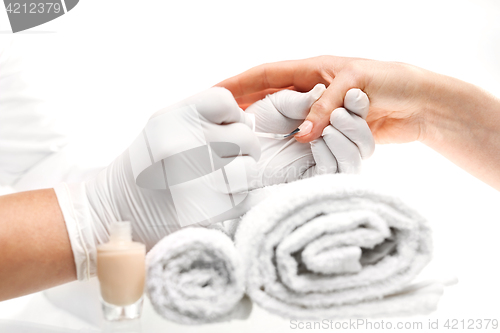 Image of Nail painting Hands woman during a manicure salon 