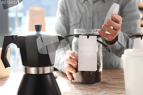 Image of Barista prepares coffee Pressure coffee percolator coffee makers Teapot coffee