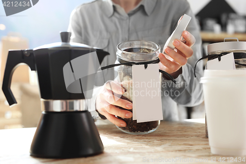 Image of Barista prepares coffee Pressure coffee percolator coffee makers Teapot coffee