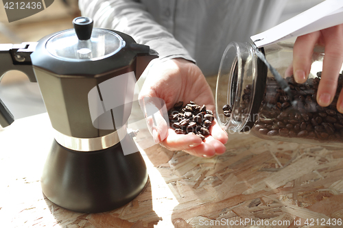 Image of Barista prepares coffee Pressure coffee percolator coffee makers Teapot coffee