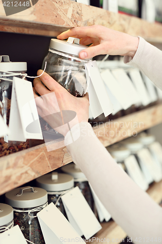 Image of Coffee on the scale, coffee shop A woman buys a cup of coffee in the coffee shop