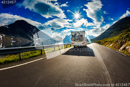 Image of Caravan car travels on the highway.