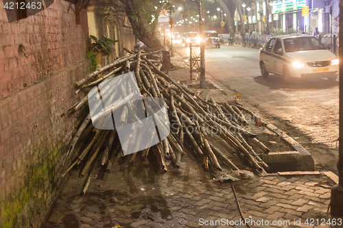 Image of Bamboo poles at night