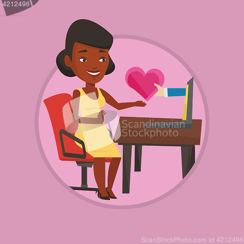 Image of Young woman dating online using laptop.