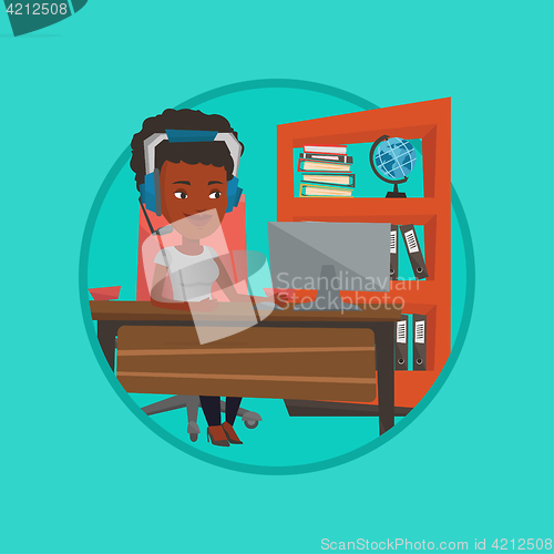 Image of Business woman with headset working at office.