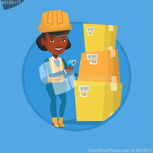 Image of Warehouse worker scanning barcode on box.