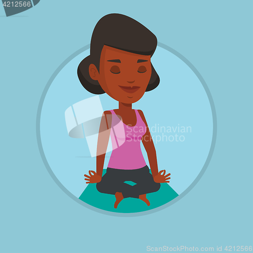 Image of Woman meditating in yoga lotus pose.