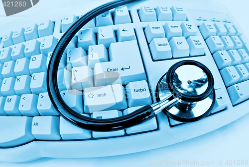 Image of stethoscope on keyboard