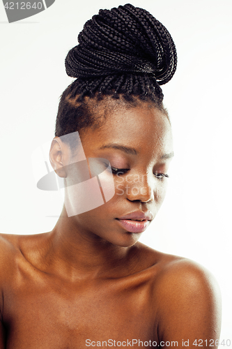 Image of young pretty african american woman naked taking care of her skin isolated on white background, healthcare people concept