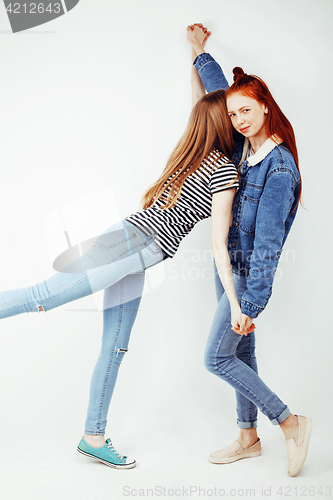 Image of best friends teenage girls together having fun, posing emotional on white background, besties happy smiling, lifestyle people concept