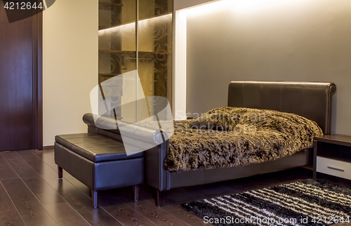 Image of Modern leather bedroom interior 