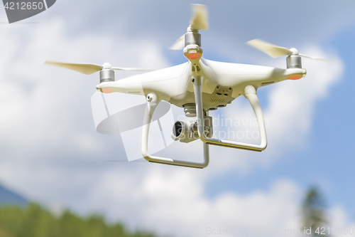 Image of Drone flying above mountains