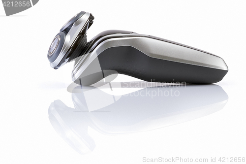 Image of Electric shaver closeup on white background