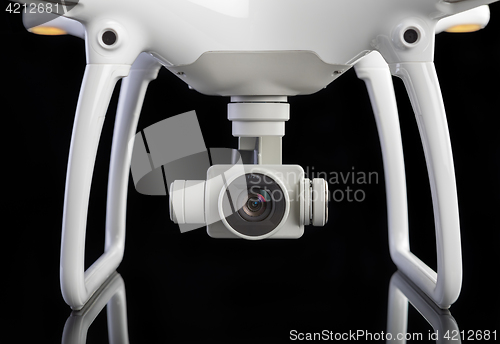 Image of White drone against black background