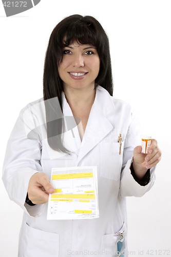 Image of Pharmacist with prescription and medicine