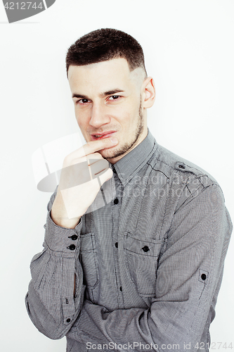 Image of young handsome well-groomed guy posing emotional on white background, lifestyle people concept 