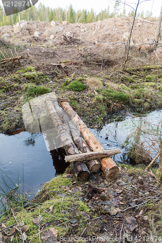 Image of Timbered footbridge across a small creek