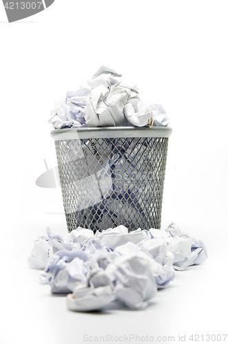 Image of Garbage bin with paper waste