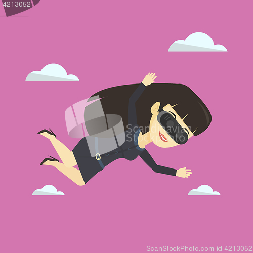 Image of Woman in vr headset flying in the sky.