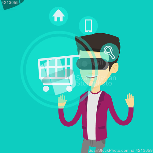 Image of Man in virtual reality headset shopping online.