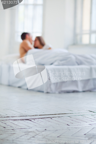 Image of Lifestyle. Beautiful couple in bed