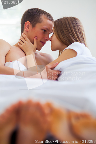 Image of Lifestyle. Beautiful couple in bed