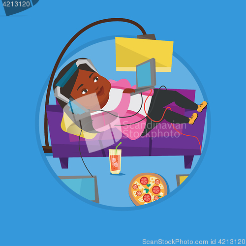 Image of Woman lying on sofa with many gadgets.