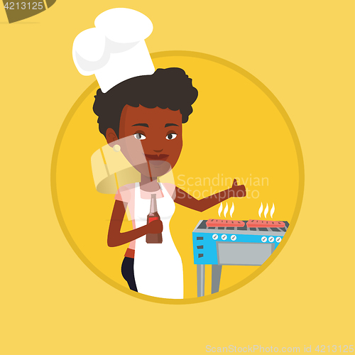 Image of Woman cooking steak on barbecue grill.