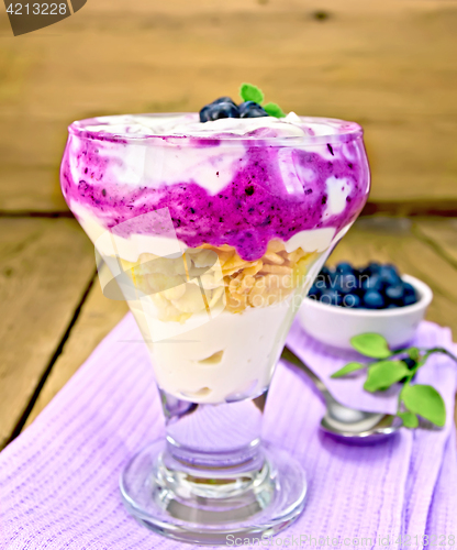Image of Dessert milk with blueberries on towel
