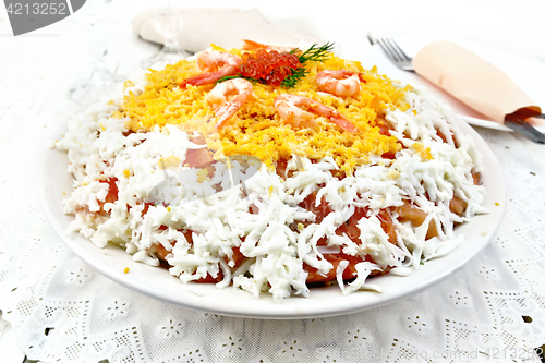 Image of Salad of salmon and seafood on table