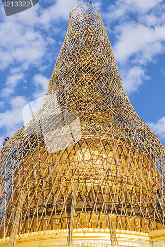 Image of Worker repareing golden temple