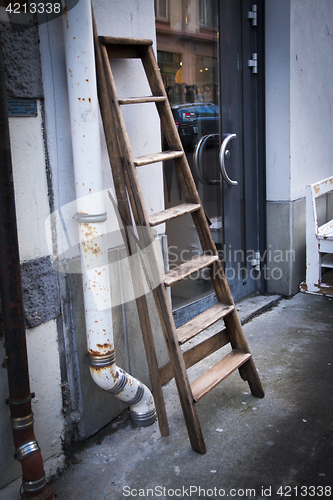 Image of Ladder by a Shop