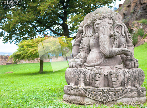 Image of Ganesha statue in a beautiful mountain garden