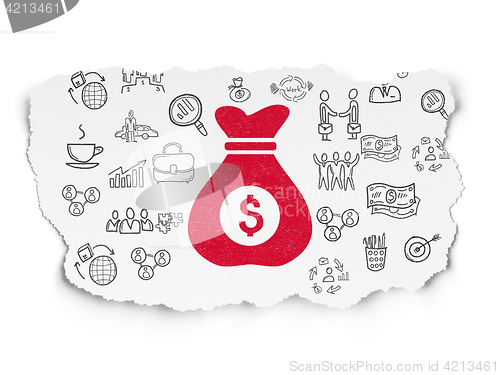 Image of Business concept: Money Bag on Torn Paper background