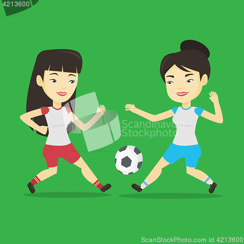 Image of Two female soccer players fighting for ball.