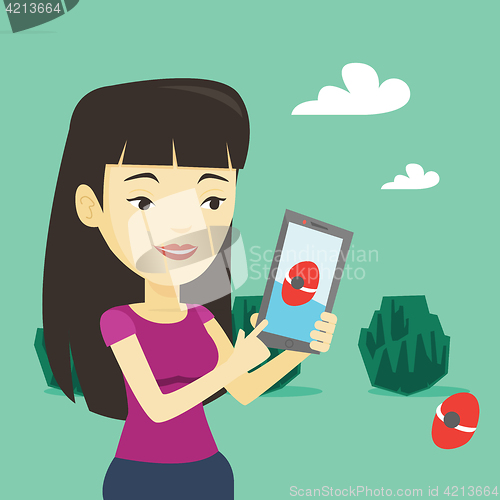 Image of Woman playing action game on smartphone.