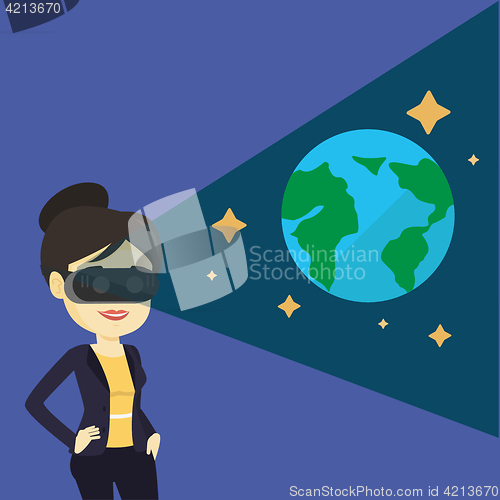 Image of Woman in vr headset getting in open space.