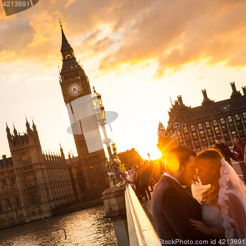 Image of Traffic and random people on Westminster Bridge in sunset, London, UK.