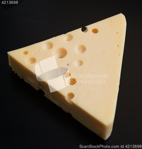 Image of cheese on black