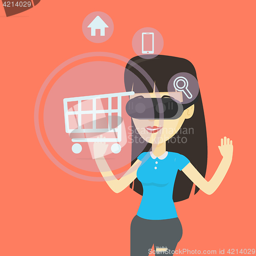 Image of Woman in virtual reality headset shopping online.