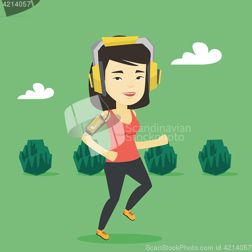 Image of Woman running with earphones and smartphone.