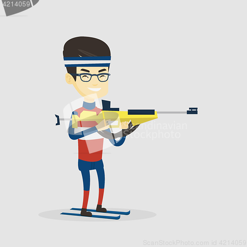 Image of Cheerful biathlon runner aiming at the target.