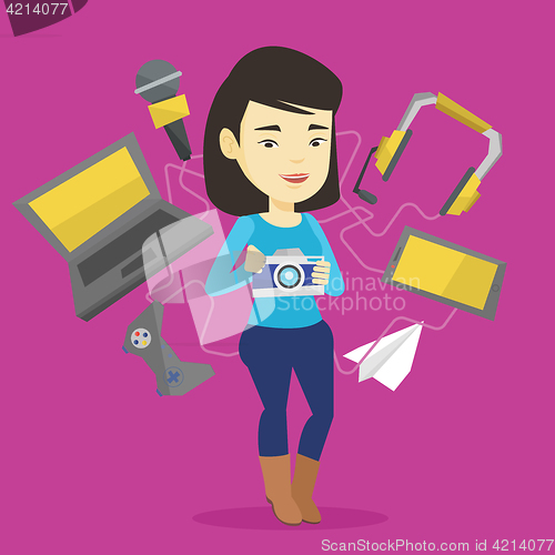 Image of Young woman surrounded with her gadgets.